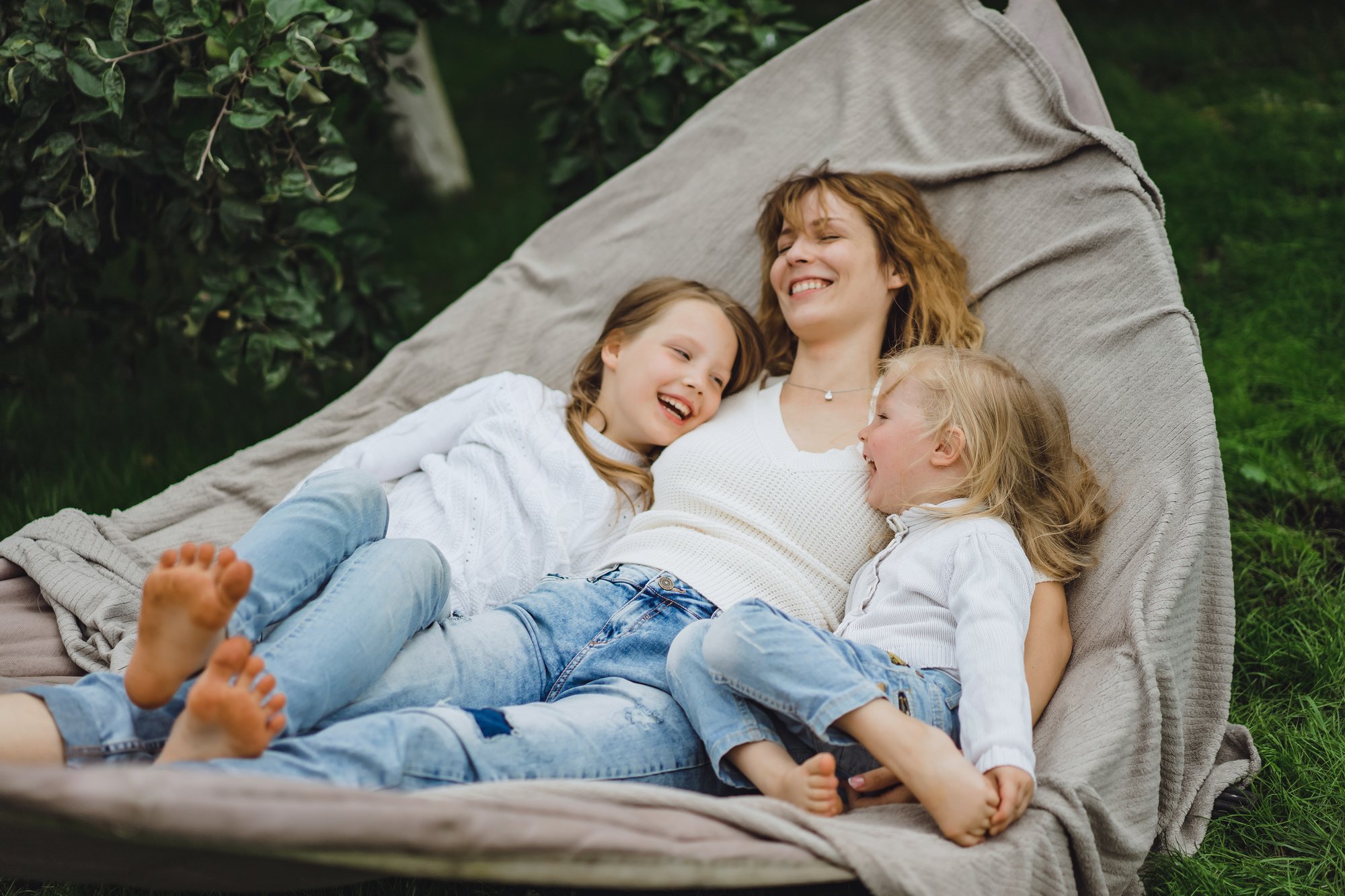 mother-with-children-having-fun-hammock-mom-kids-hammock