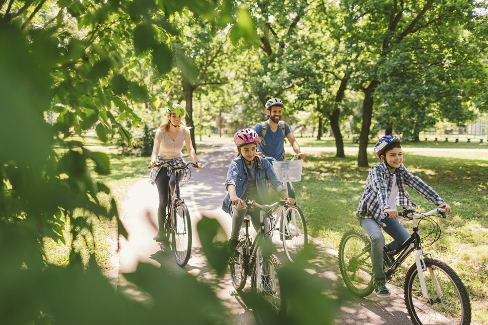 Sage family riding through park